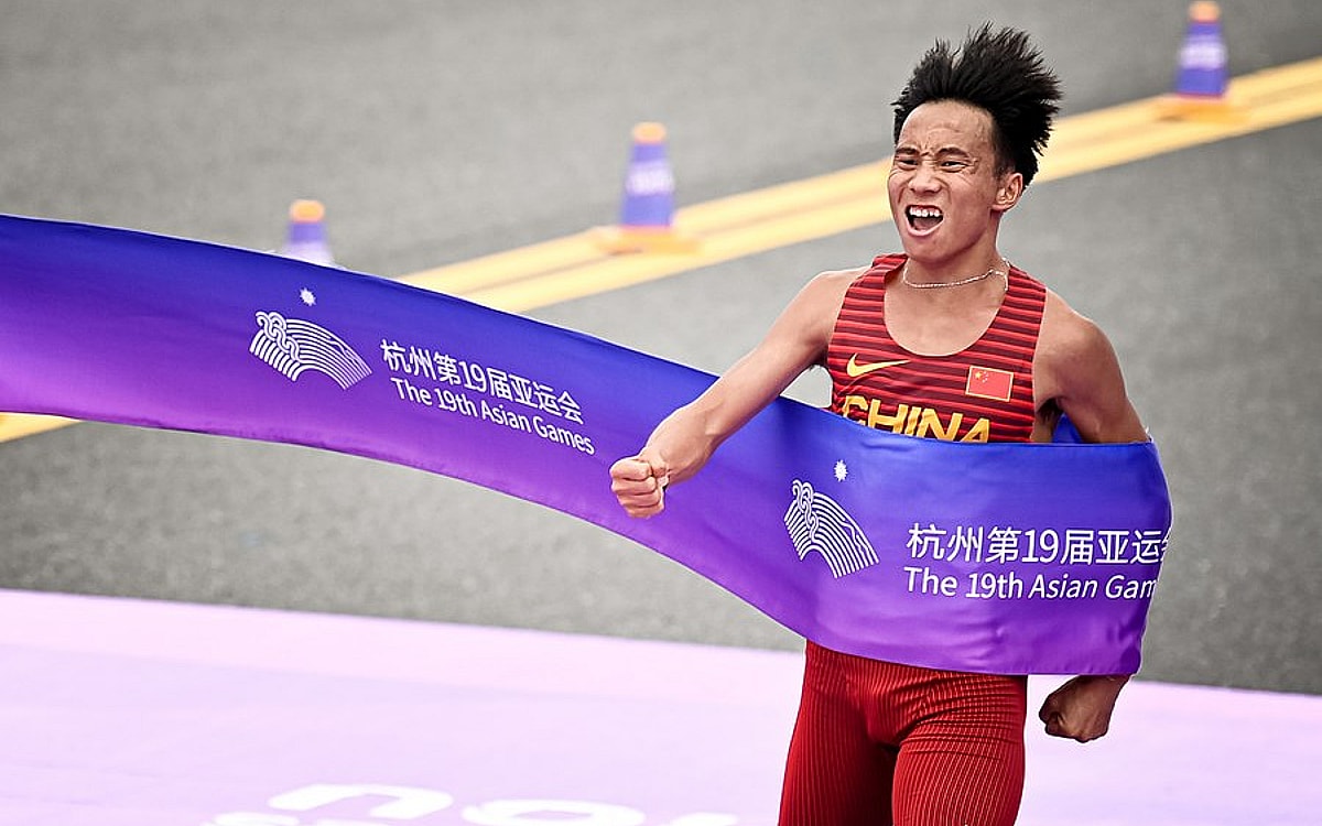 He Jie breaks new ground for China in men's marathon as the hosts retain women's basketball title