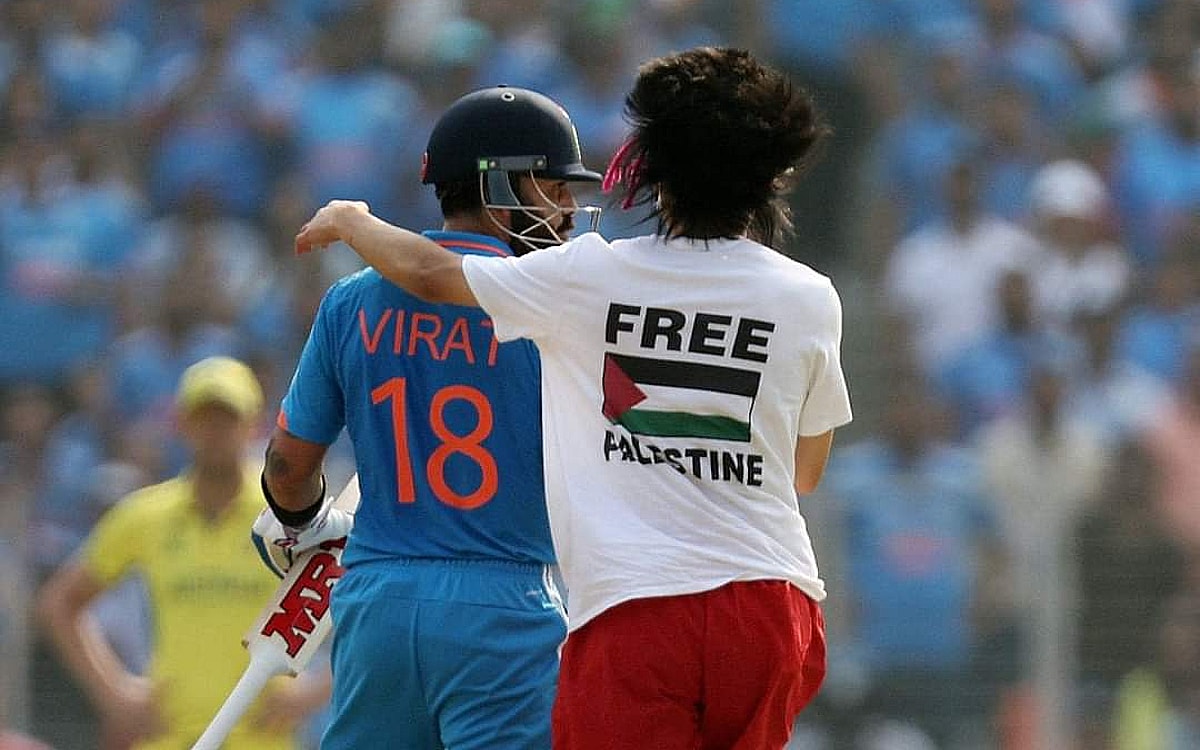 Pitch invader wearing 'Free Palestine' T-shirt hugs Kohli