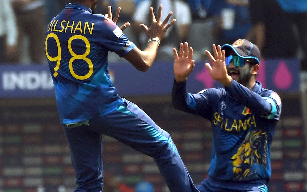 Sri Lanka players wear black-arm bands as a tribute to their renowned fan Abeysekera