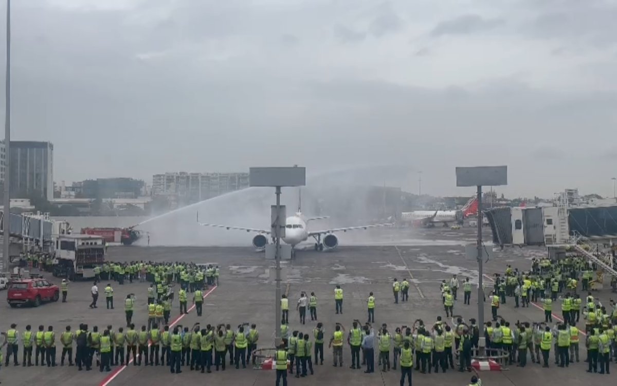 Team Accorded  water Salute  After Plane Lands, Mumbai Buzzing With Chants Of ‘India Ka Raja Rohit Sharma’ As Champions Return (Ld)