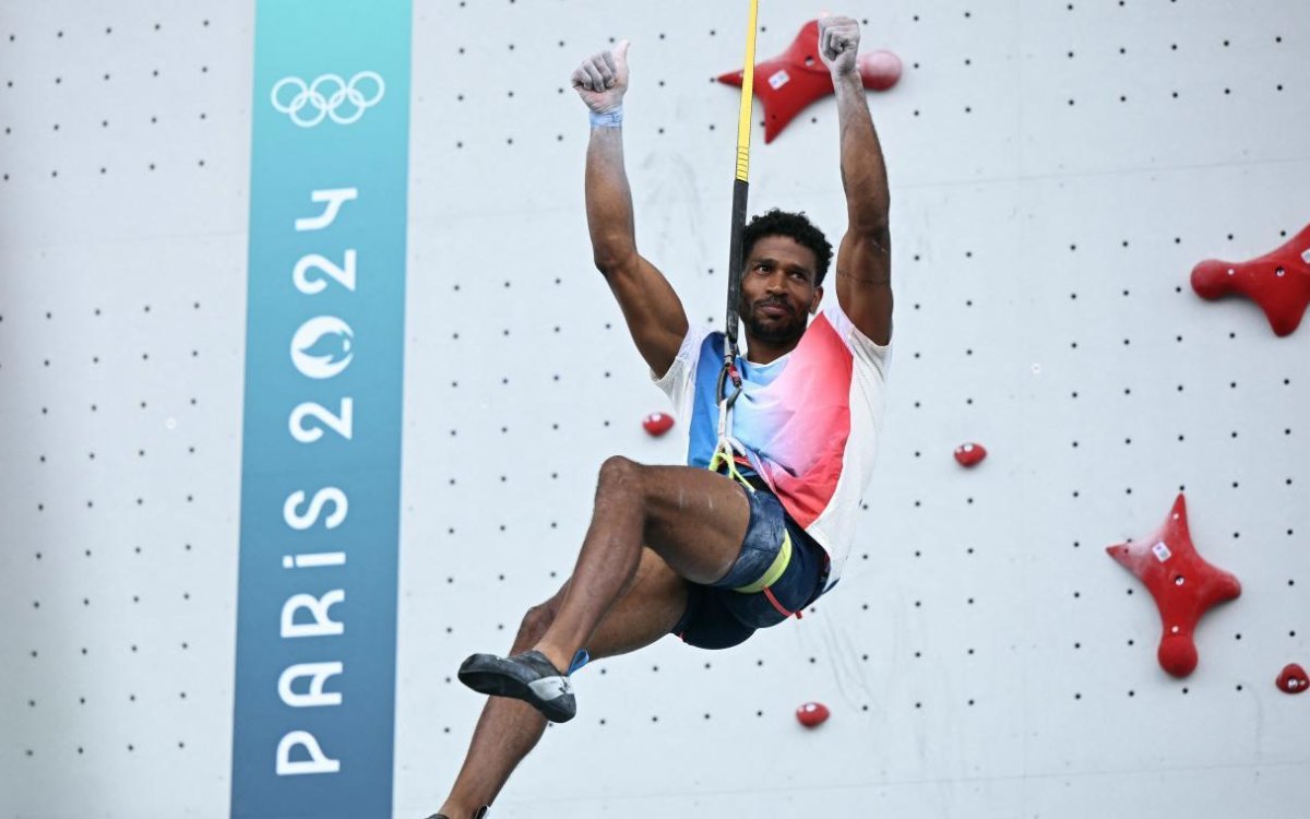 Paris Olympics: A Climber Ascending Through Time To The Top